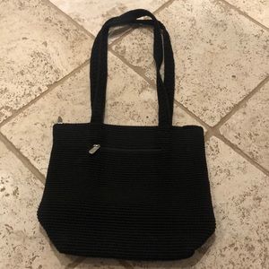 The sack black macramé handbag